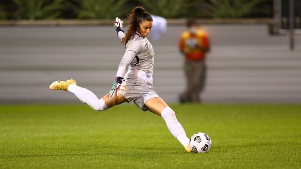 Goalkeeper Lysianne Proulx clears the ball out of the box